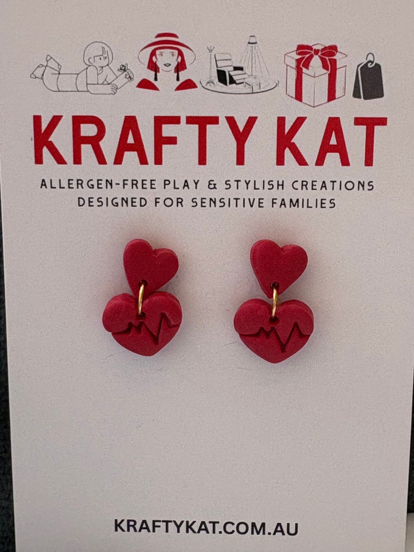 Small Red Heart with a Red Circle with a Heartbeat Line Dangle Gold Stud Earrings