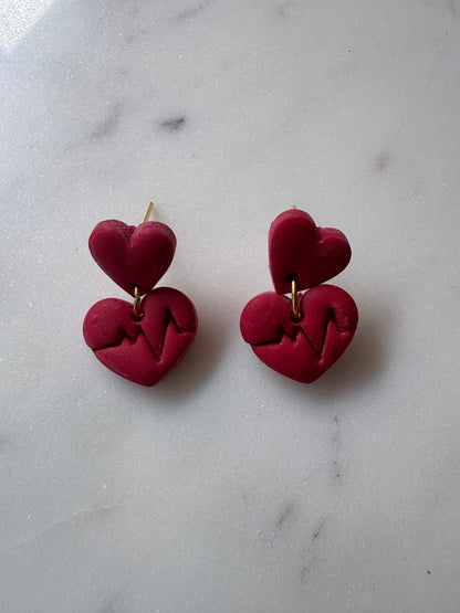 Small Red Heart with a Red Circle with a Heartbeat Line Dangle Gold Stud Earrings