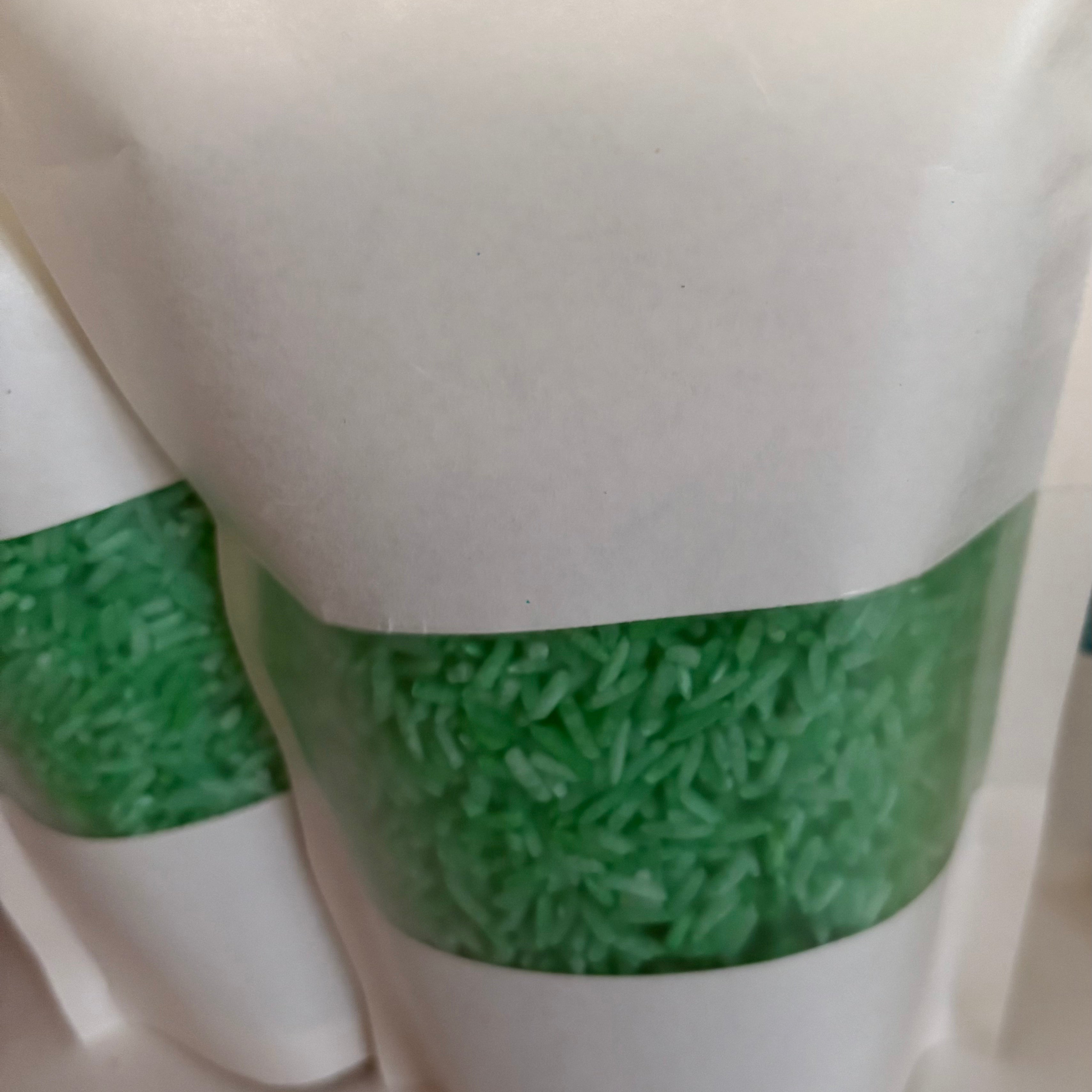 A bag of Krafty Kat Sensory Rice coloured green