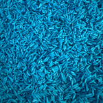Pictured of some of the Krafty Kat Sensory Rice coloured blue