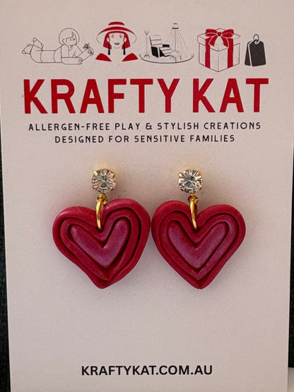 Shimmering Heart Inside a Larger Heart Dangle with a Cubic Zirconia Stud Earring