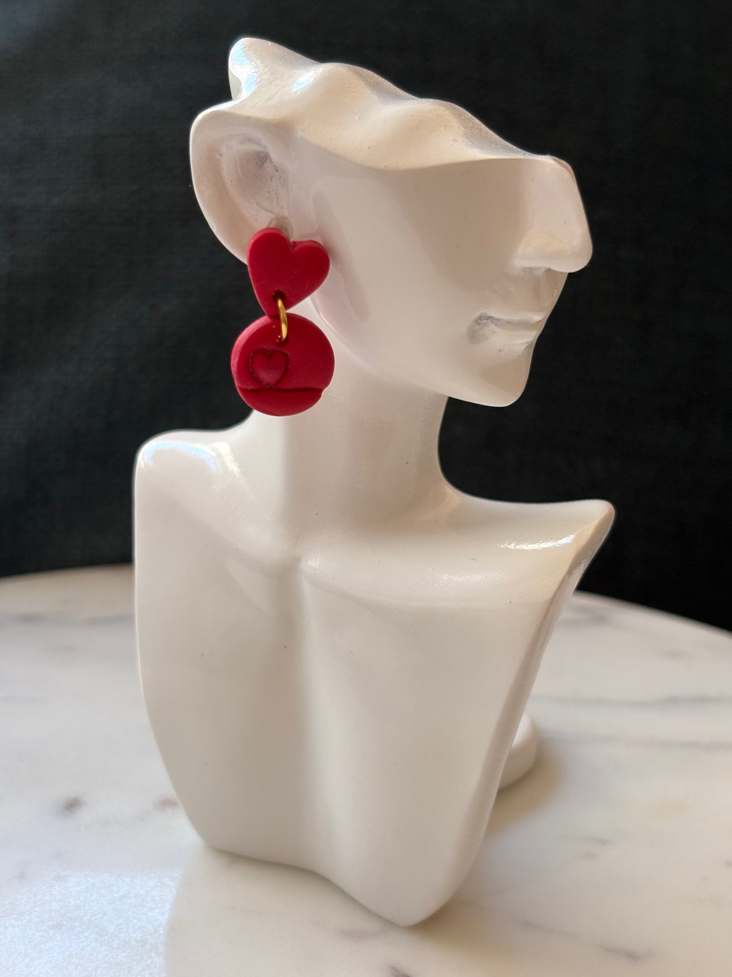 Shimmering Mini Heart Inside a Circle with a Small Red Heart Gold Stud Earrings