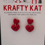 Small Red Heart with a Red Circle with a Heartbeat Line Dangle Gold Stud Earrings