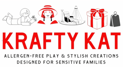 A logo-style graphic with the words 'KRAFTY KAT' in large red letters and smaller black text below reading 'ALLERGEN-FREE PLAY & STYLISH CREATIONS DESIGNED FOR SENSITIVE FAMILIES.' Above the text are simple line drawings in black and red: a child lying down playing, a woman wearing earrings, a home scene representing homewares, a gift box with a red bow, and a shopping tag meaning Play, Shop & Gift with Krafty Kat.