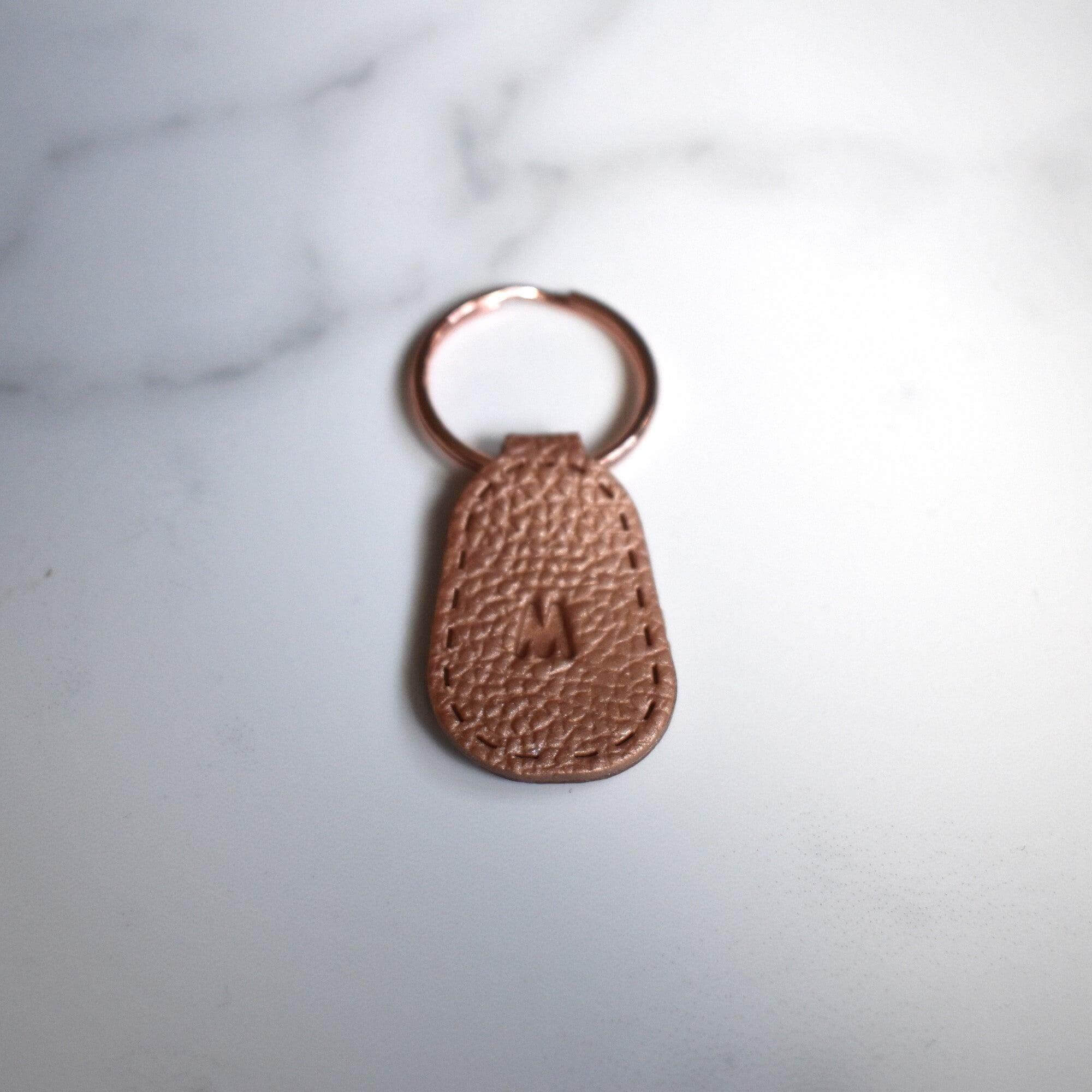 Bronze Imprinted ‘M’ Leather-Look Gold Keyrings - Krafty Kat