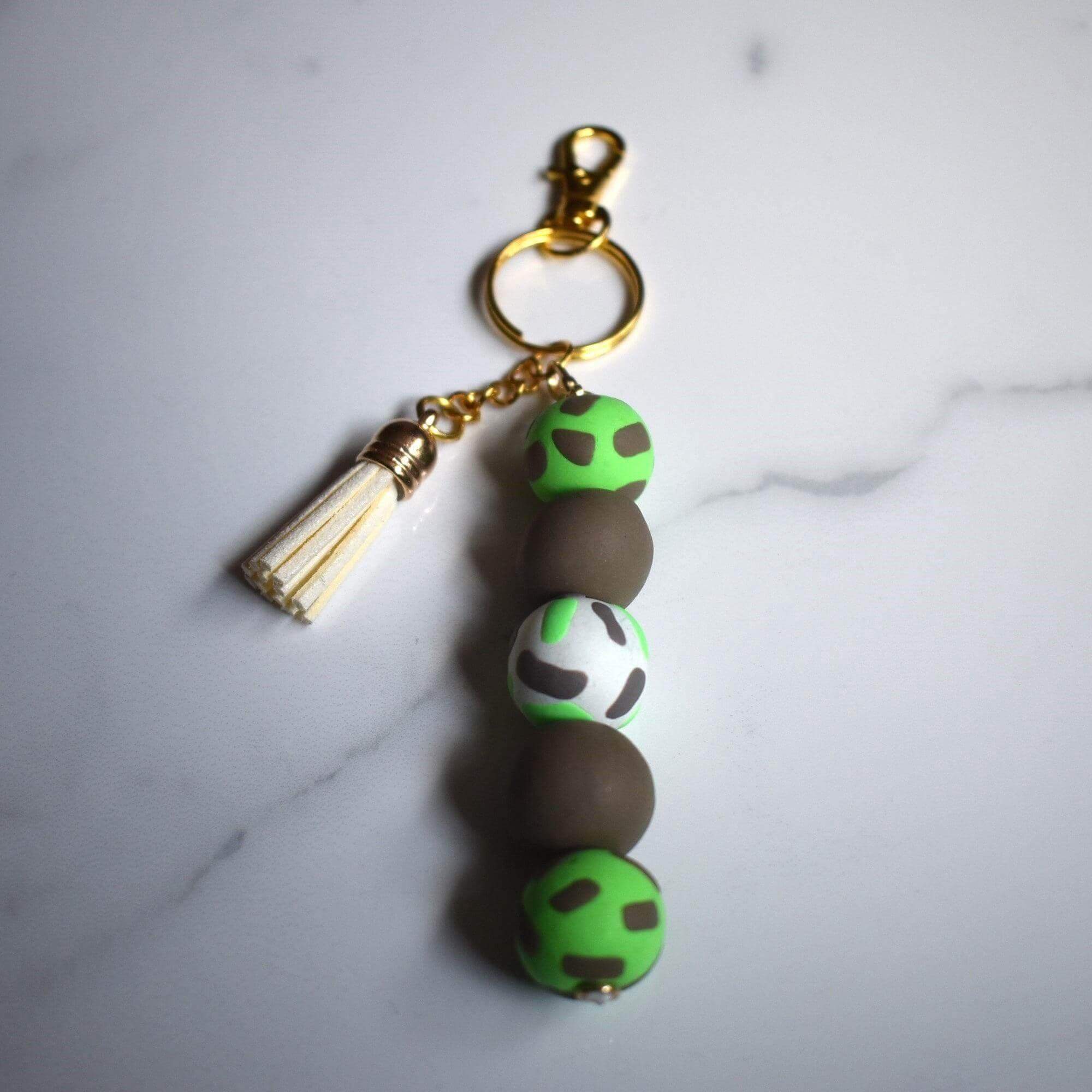 Gold Beaded Keyring with Cream Tassel and Brown Green & Cream Camo Beads - Krafty Kat