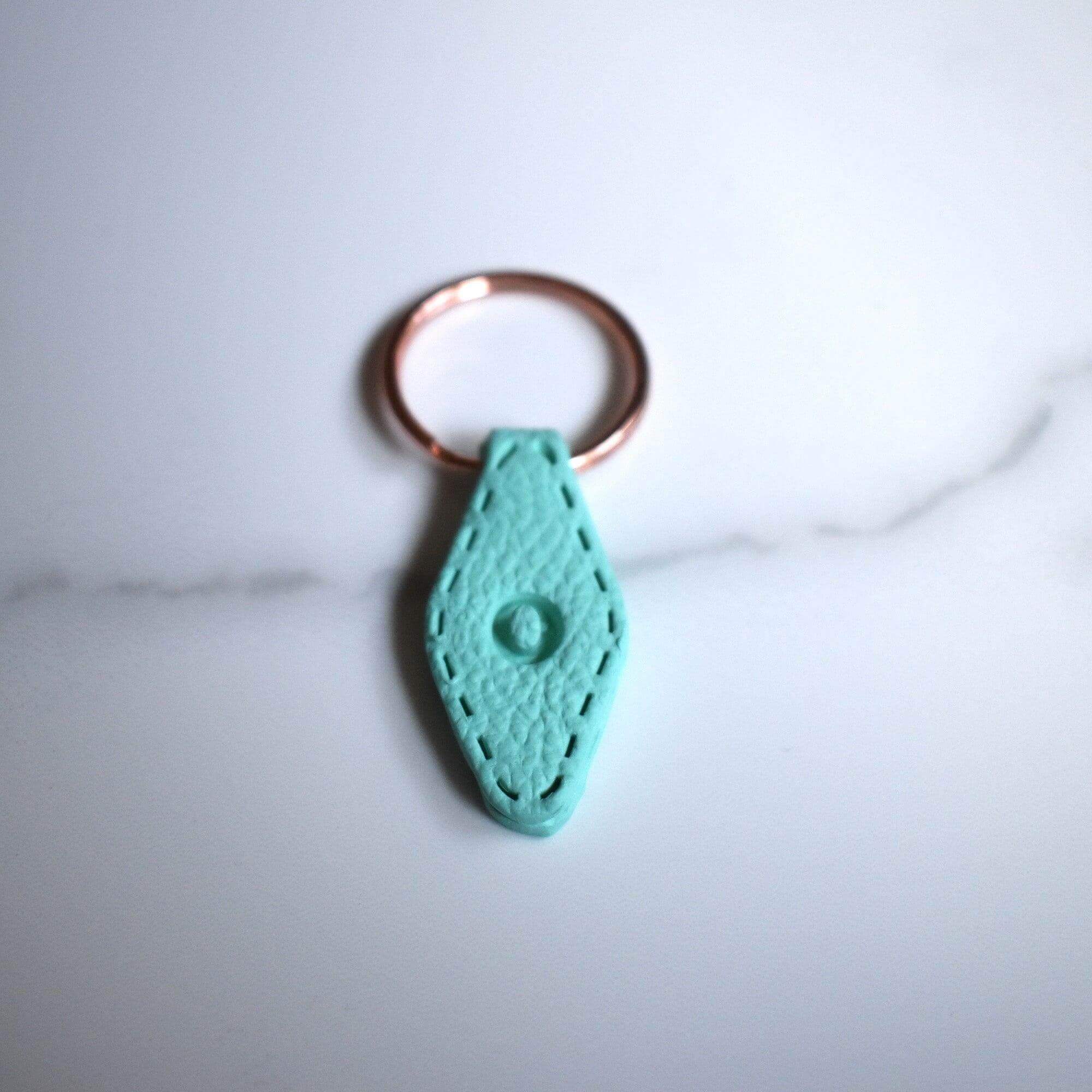 Green Imprinted ‘O’ Leather-Look Gold Keyrings - Krafty Kat