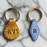 Light Blue Gold Imprinted ‘R Leather-Look Gold Keyrings - Krafty Kat