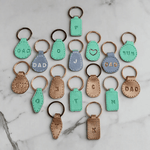 Light Blue Imprinted White ‘Dad’ Leather-Look Silver Keyrings - Krafty Kat