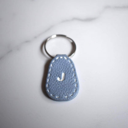 Light Blue Imprinted White ‘J’ Leather-Look Silver Keyrings - Krafty Kat