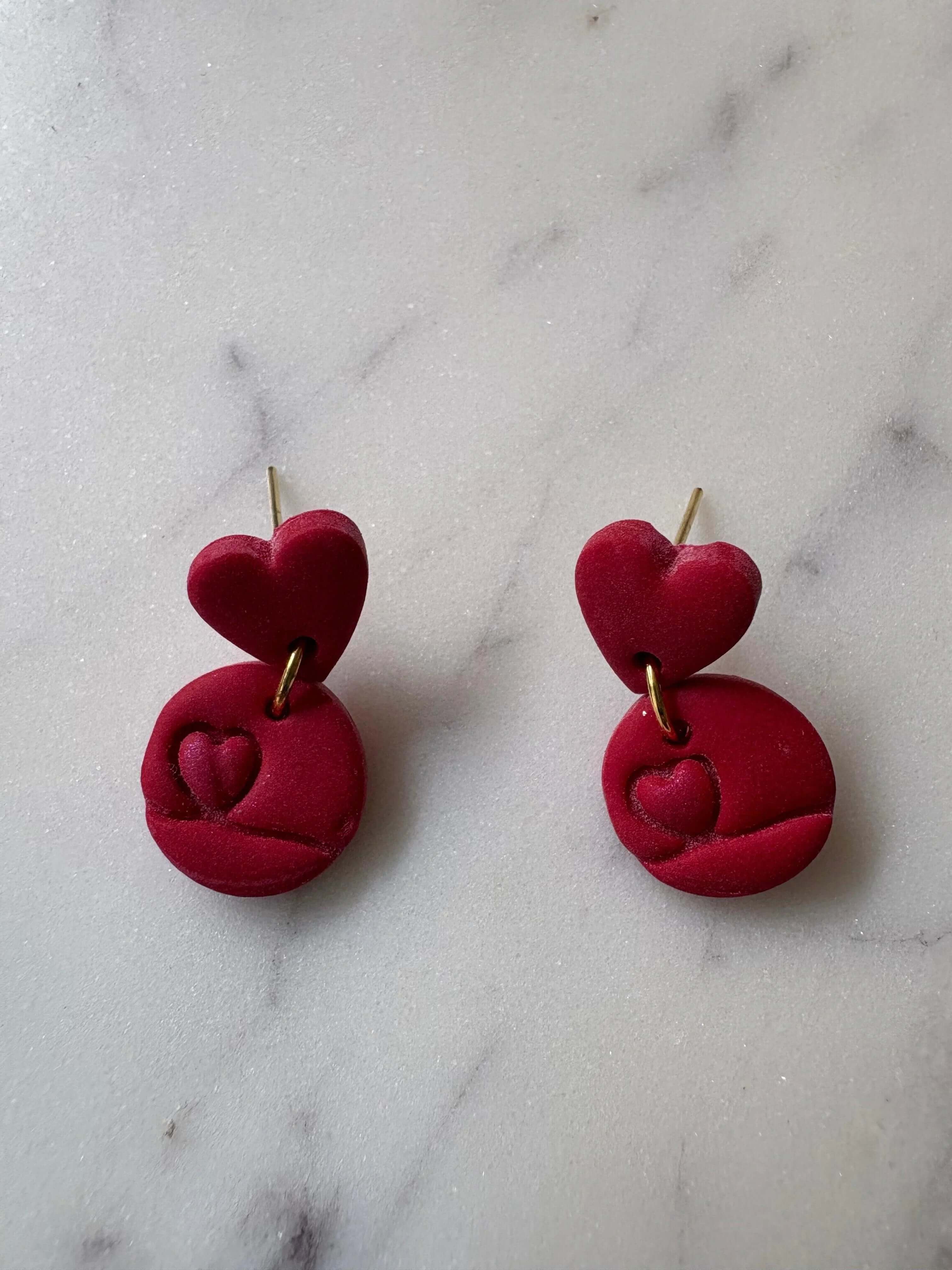 Shimmering Mini Heart Inside a Circle with a Small Red Heart Gold Stud Earrings - Krafty Kat